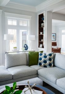 Bright living room with green accents